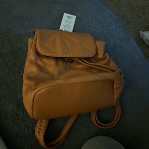 Burnt orange quilted backpack #backpack #tan